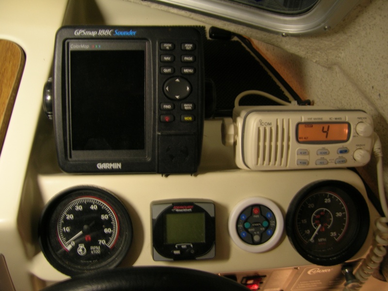 Garmin 188C, decent VHF, Tach, Speedo, digital motor guage, and remote radio control all at helm. This is how she came. no need to change anything here now.