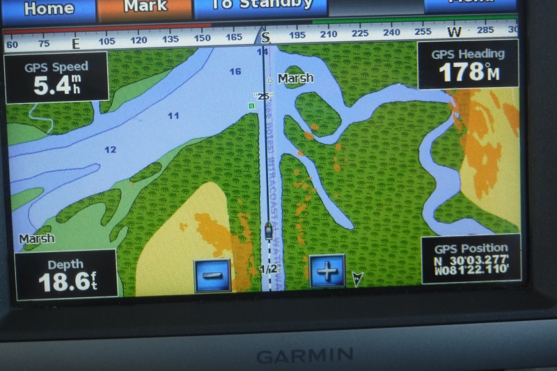 Garmin 740 Chart plotter w/ Radar in "Overlay" mode.
The radar is in \"Overlay\" mode and shows as orange on the screen.  Inter-coastal waterway Florida entering the St John River.  We found the radar could often pick up navigation buoys before our eye could find them.  Very confidence building in strange waters.