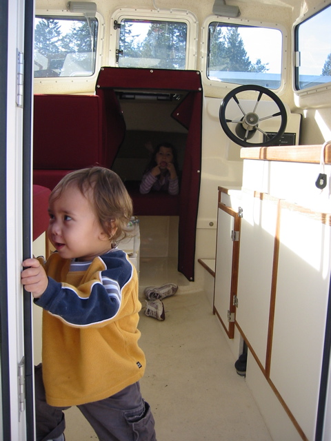 Grandson Evan inspecting Grizzly