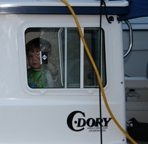 Griffin ( of Gigi) at hoem in his boat that goes \"Vroom\"