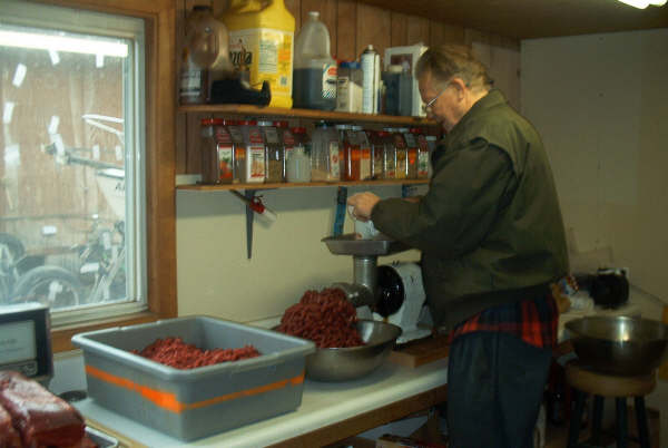 Grinding burger in the outdoor kitchen.JPG