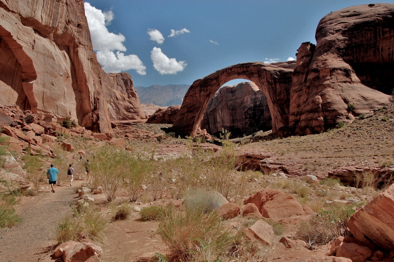 Group hiking to bridge.