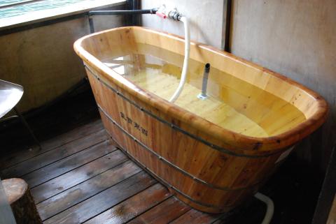 Hand carved wooden tub donated by a ship?s captain