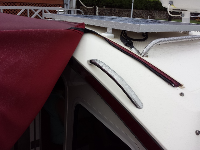 Handle fits nicely under bimini