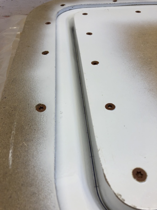 Here's the assembled mold ready to fill with epoxy resin and fiberglass. The molds were constructed from MDF, painted white with three coats of lacquer, and then sealed with six coats of mold release wax.