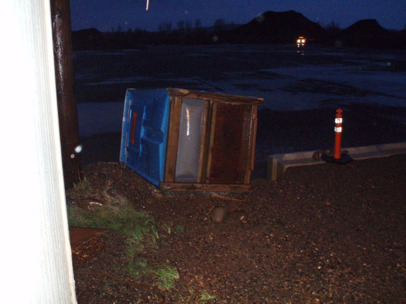 How a windy day can go really bad!  It's teetering on a 3 1/2" embankment.