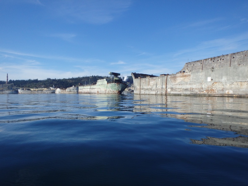 Hulks used as breakwater for mill