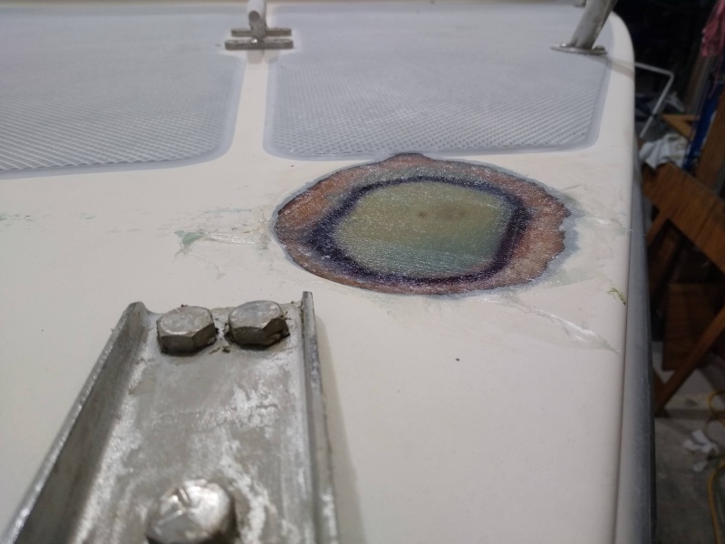 I glassed both sides of 3/4? piece of plywood core to fill hole. Once faired it was finished with a krylon paint job. High build primer filled by antique white top coat. Close enough.