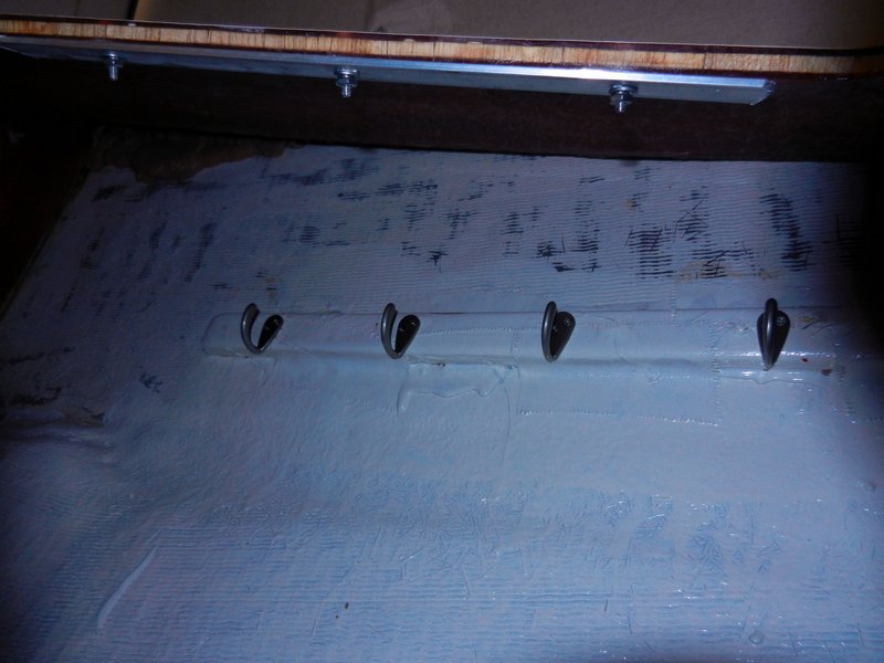 I put rows of hooks for various things on both sides