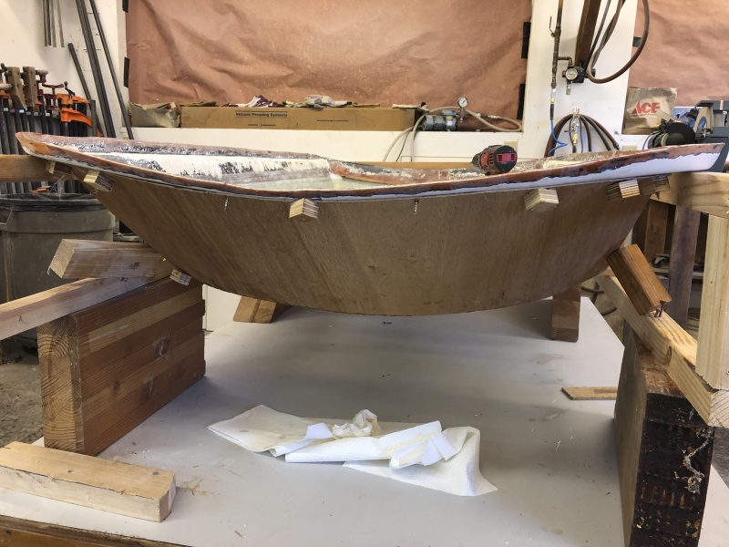 I used 1/8" smooth masonite to make a curved form section to close the front of the roof.