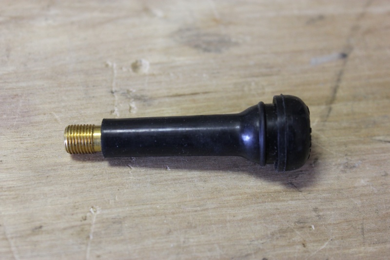 I used a tire air valve to get the antenna cable through the roof.  It is a snug fit; hopefully water will stay outside of the cabin.