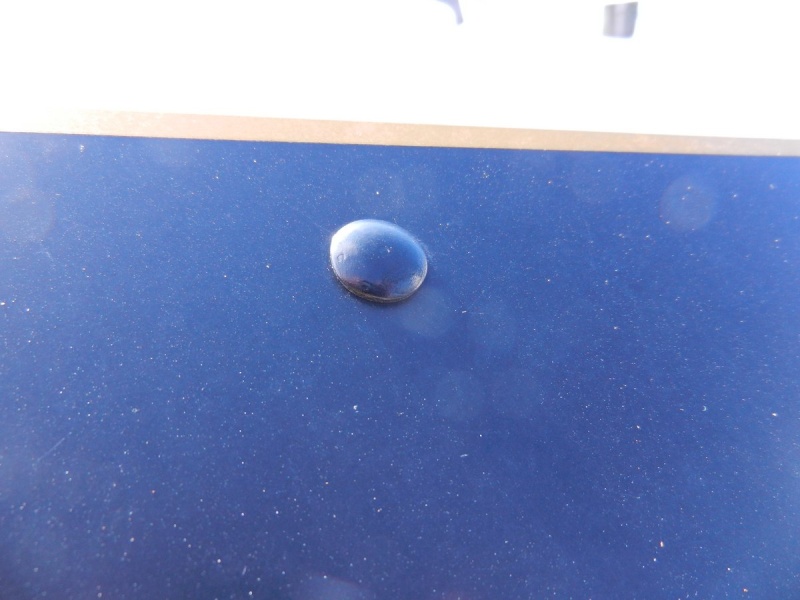 I used gloss black enamel on the bolt heads after sanding them a bit first.