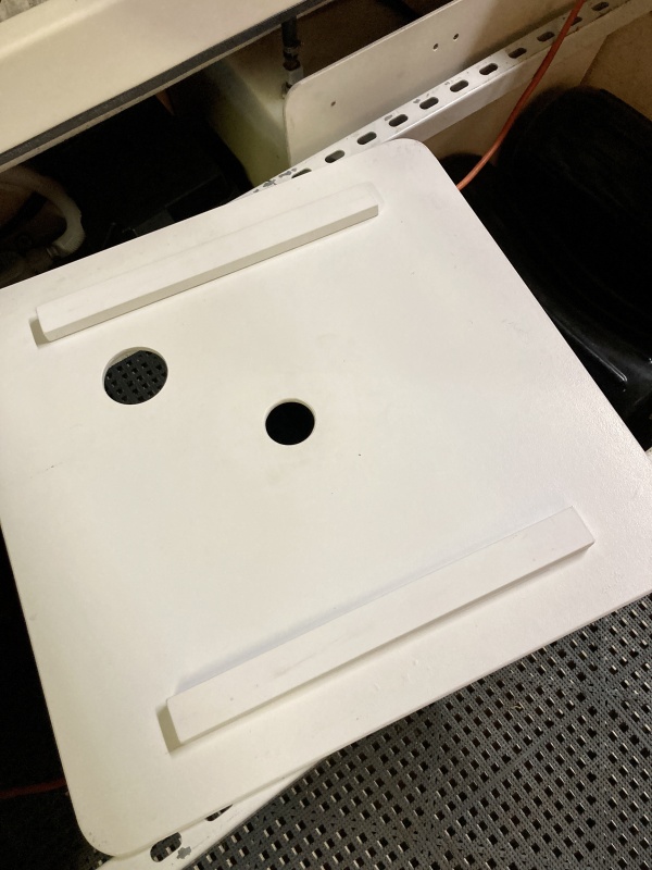 I used PVC wood stuff from lowes for the back retaining pieces (the extra hole is for the fresh water fill cap on the porta potti that was too high after deciding to install dri-dek - whoops