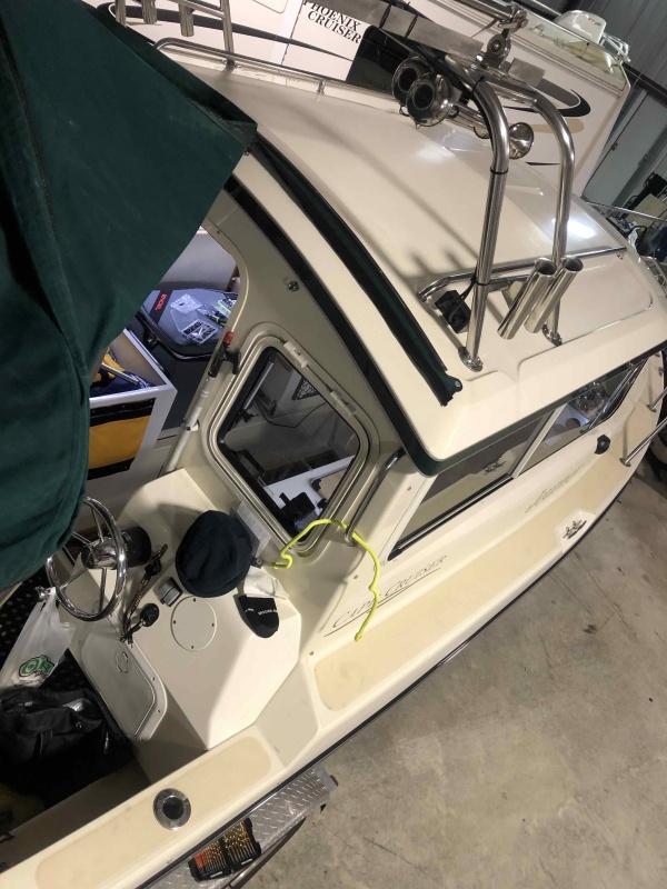 Installed snaps to solar panel to hold bimini back for easy entry to boat when docked. 3