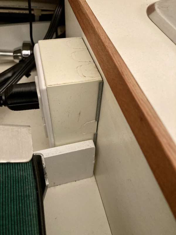 it's just a U shaped affair (in my case it barely squeezed between the outlet box and the seat)