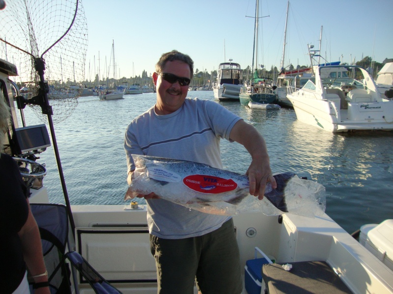 Jeff, a TomCat owner, is very proud of the salmon he caught