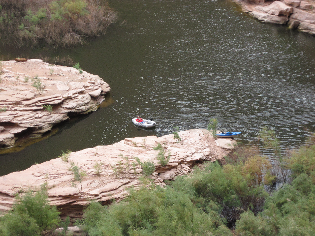 Jim in Dinghy from Defiance House at Forgotten Canyon 9-15-09.Sized