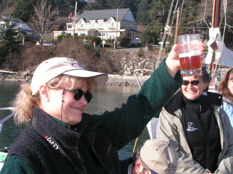 Jo toasting the new name of "her" new boat Spirit.