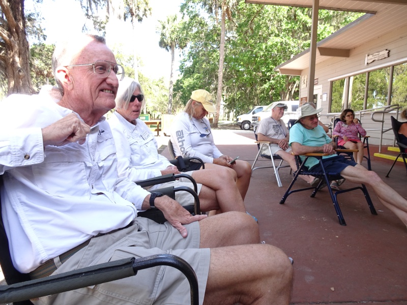 John and Eileen listen intently--others seem to be enjoying the siesta.