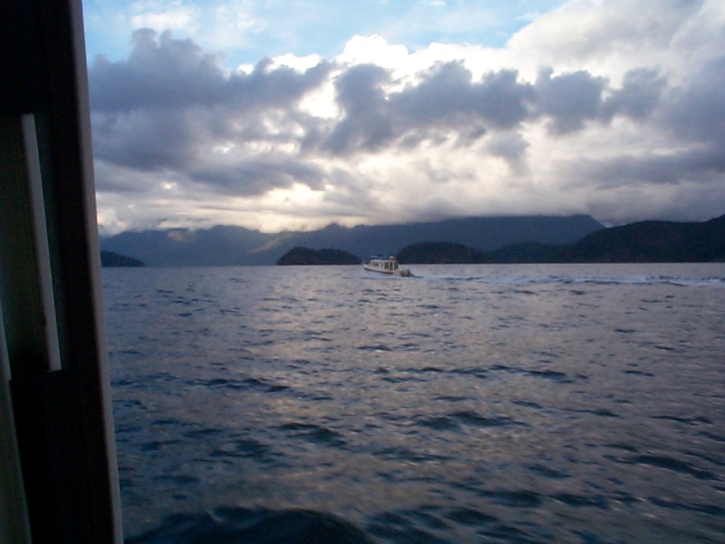 Just before entering Roscoe Bay. As soon as we finished dinner an intense thunderstorm hit - lighting, thunder, hard downpour, and some hail. But we were secure.