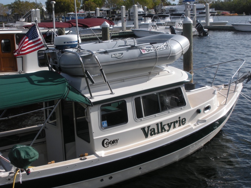 Just discovered that an inflatable can be put on a tall top not inverted.  I had always inverted before this.  Let's see those dinghy thieves try to get it this way quietly!  That's a Nordic Tug 26 tied up next to me.

A dock walker asked me if I really needed radar on an inflatable!