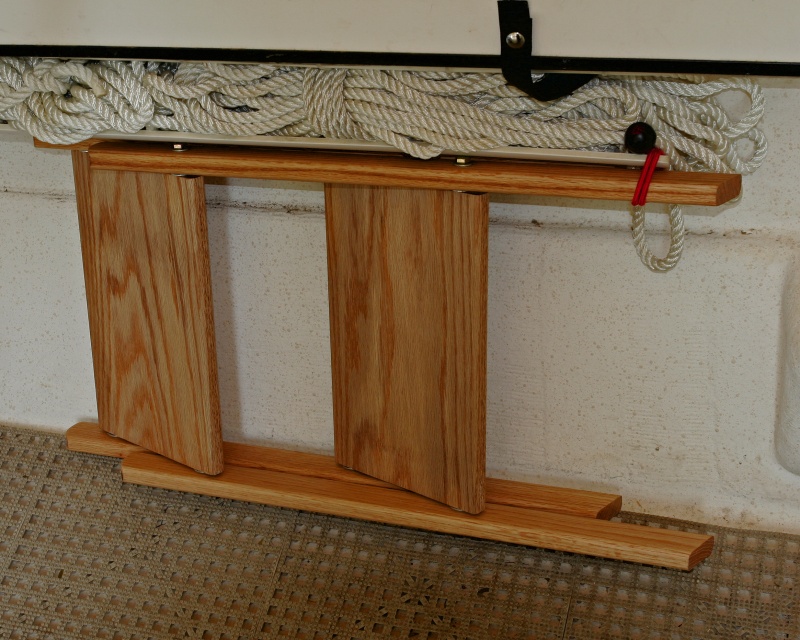 Ladder stowed up under gunnel
