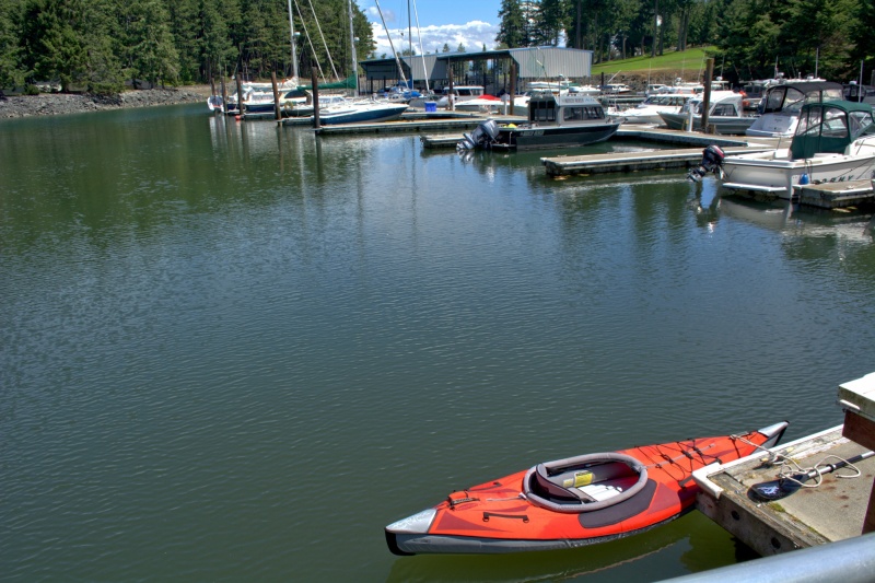Landing the kayak in the marina dock to stay dry. The Advanced Elements inflatable has served me well for the last 15 years.