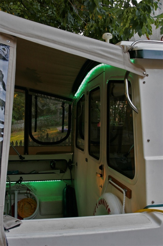 Led rope lighting installed under both port and starboard gunnels draw only .4A. Only one side is needed to illuminate the cockpit and much of the cabin. The rope over the cabin is just for fun.