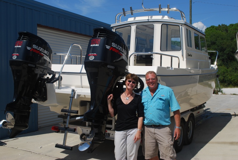 Linda with Marc Grove, owner of Wefings Marine in Eastpoint Florida where we purchased Destiny in September 2009