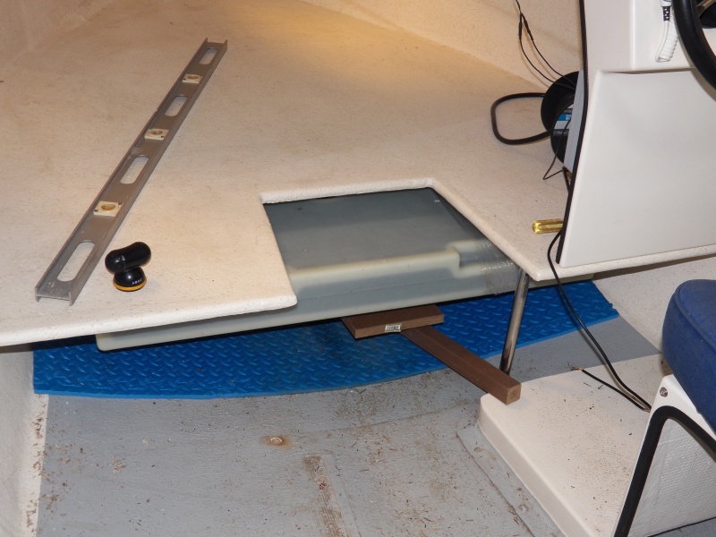 Lining things up to make sure on chock placement and that the fill (to the right) will be accessible.  The tank can't be tight against the underside of the V berth because of the fill and electric sender unit.  I also need space between the tank and the berth for my proposed "ground tackle," which will get it's own album when I start that project.
