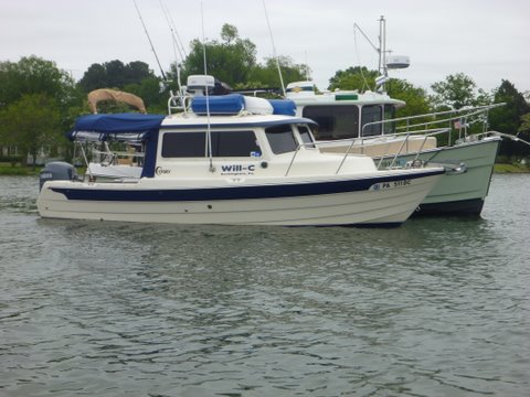 Loaded for cruising,dink in the cockpit along with cooler dink motor, barbecue up on the radar arch, full of fuel and water. Lot's of fixed docks with pilings, some make up a fender board made out of 5'or 6' PVC pipe with a line out of both ends so the PVC pipe hangs outside of the bumpers and is against the pilings. I use big bumpers with a line running thru it and knots on either side of the bumper to prevent it from sliding on the line. I tie the line off at both ends to the roof's grab rail and keep the bumper horizontal centered on the piling