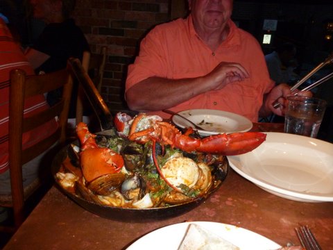 Lobster Diavlo for two ($47.50) at Portland's Street and Company restaurant. A pretty big lobster split, clams, mussels, calamari over linguine in a mildly spicy light red sauce. It fed us twice. Best meal we ever had. Me ready to pick out some items for my plate