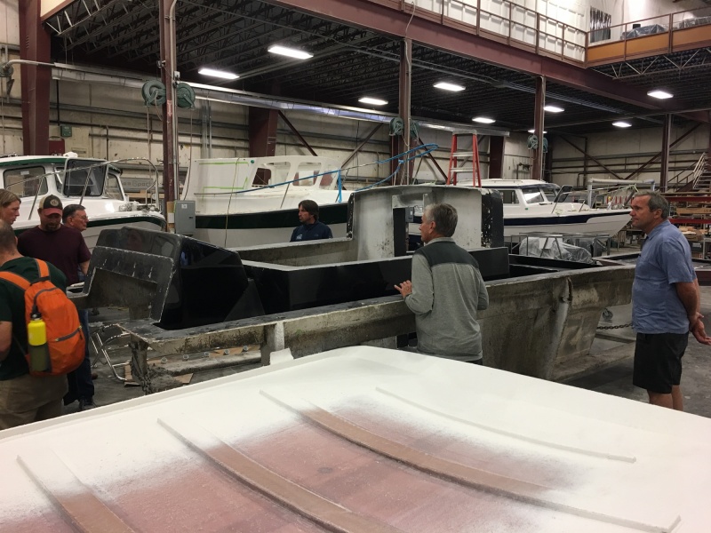 Looking over towards the final assembly and rigging area, with the C-Dory 19 deck mold in foreground