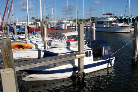 Low tide - the top of the boat is at the same level as the finger dock
