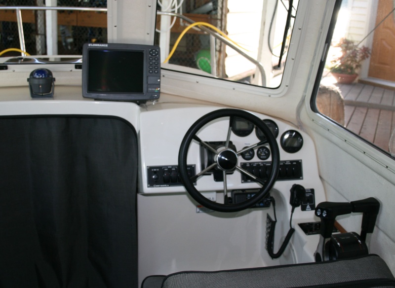 Lowrance LCX-113C HD Sonar/GPS Chartplotter installed (mounted flush - more stable) along with Richie compass.