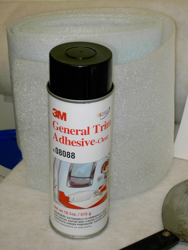 (Lynn Marie) Adhesive used for the project. Can is sitting in front of the 8" wide closed cell sill sealer used under the carpet on the hull sides.