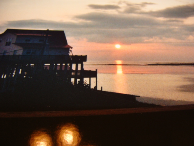 Major fishing hole at sunset from house deck