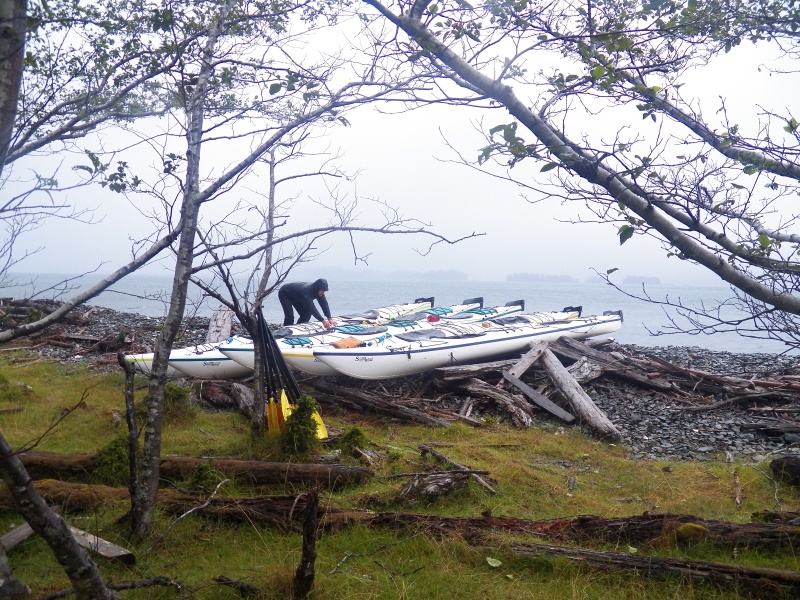 Making sure that the boats are well above the tide and secured to the trees.