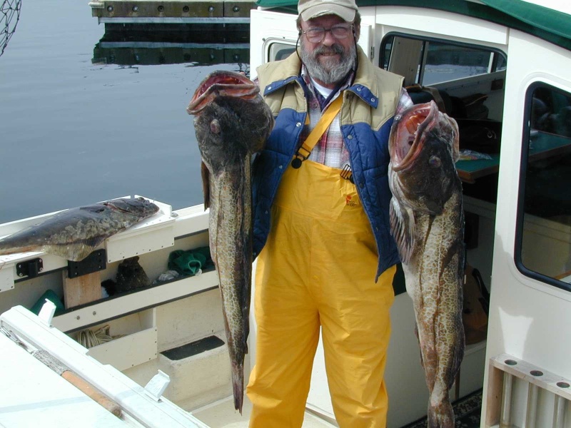 (Mason C. Bailey) Neah Bay Trip 5/10/05
Jim with 2 more nice Lings from 72 square.  I think I need to enlarge my fish cleaning station or at least make a larger one for the starboard side.