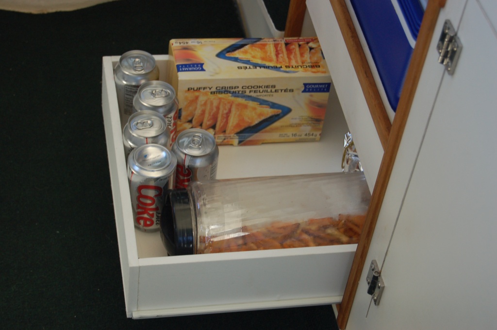 (Minnie Swann) Bottom drawer is for snacks and mix.
