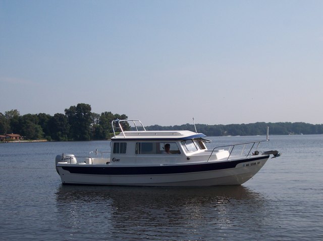 Miss Curious At Home On The Magothy River In MD With Radar Arch and Anchor Windlass Visible