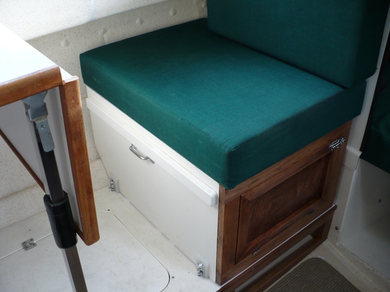 Most of the seat was recycled from the original seat box. Front, side and bottom panels were added along with the floor/deck. All painted to match.