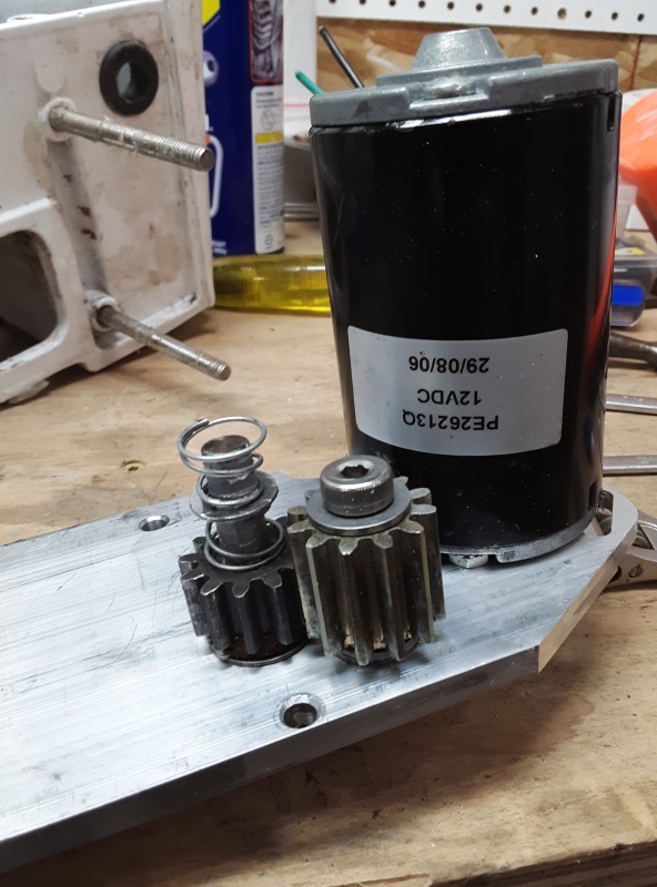motor, locking gear in new location, and spinoff gear