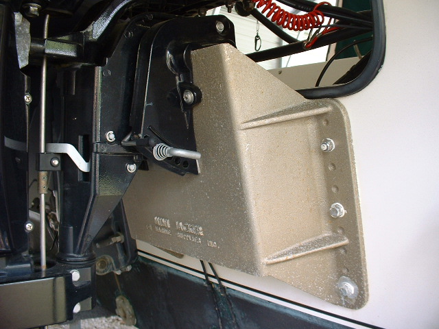 Mount raises the motor about 3 inches as well as moving it aft. Lower unit clears the water while underway with kicker tilted up. Also provides extra clearance for steering cable.
