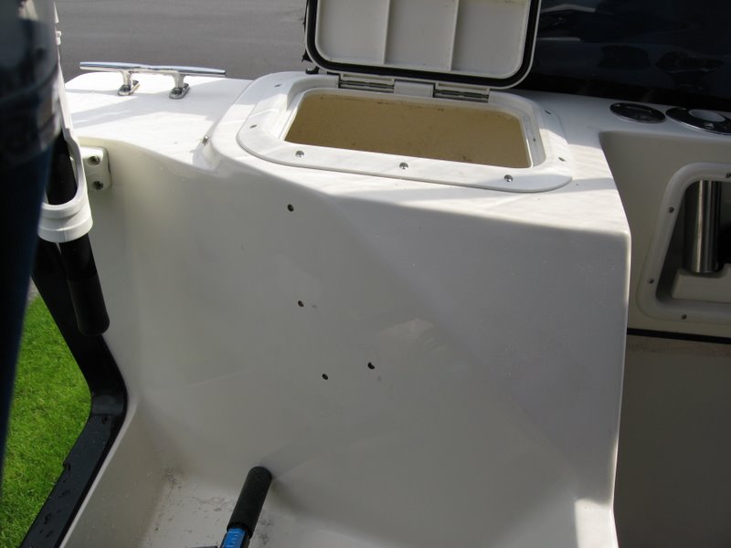 Mounting holes drilled into Port laz.