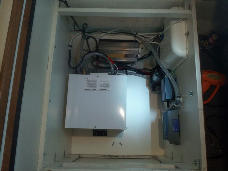 New 4 gallon tank leaves room for more storage and improves accessibility for servicing