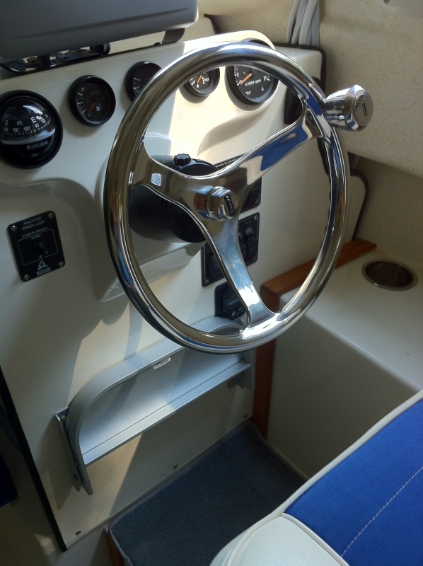 New Edson Comfort Grip Power wheel and helm step.
Smaller diameter and smooth stainless steel makes it easier for me to slide into the helm seat.