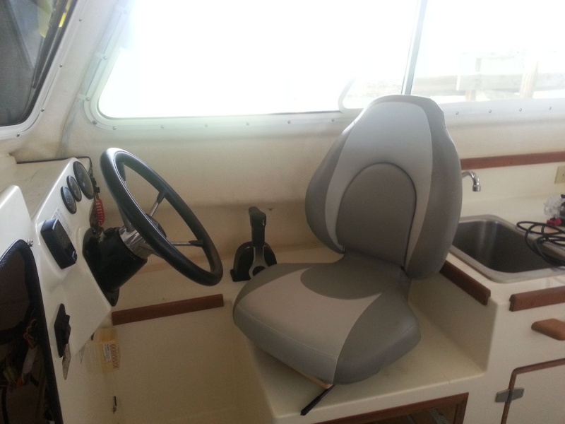 New helm seat, Attwood Centric? model.  This is the helm seat swiveled to 45 degrees
