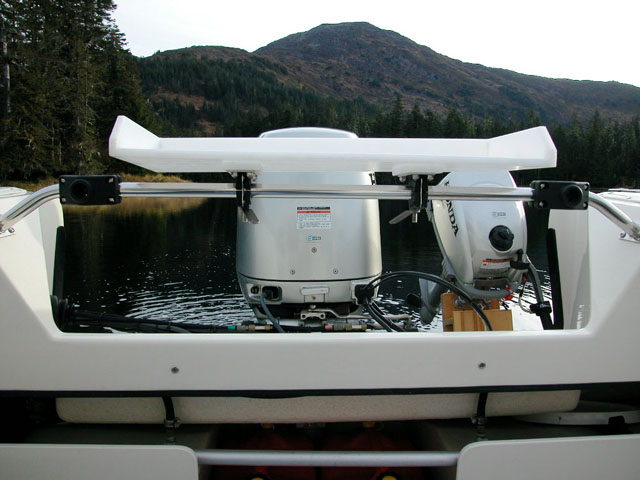 New stern railing with rod holder brackets and new fish cleaning table of my own design