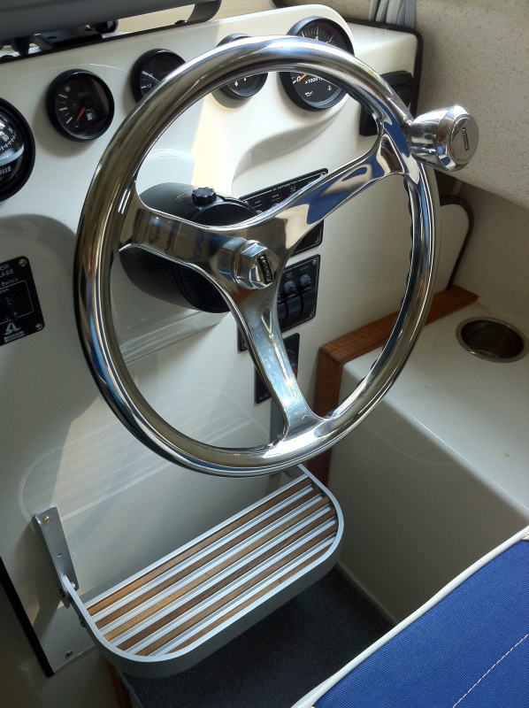 New wheel and helm step. I really like the wheel but the helm step is probably even a better addition. It makes it a lot more comfortable cruising long distances and is also nice when a youngster gets to drive the boat. Both are SIMPLE installs.